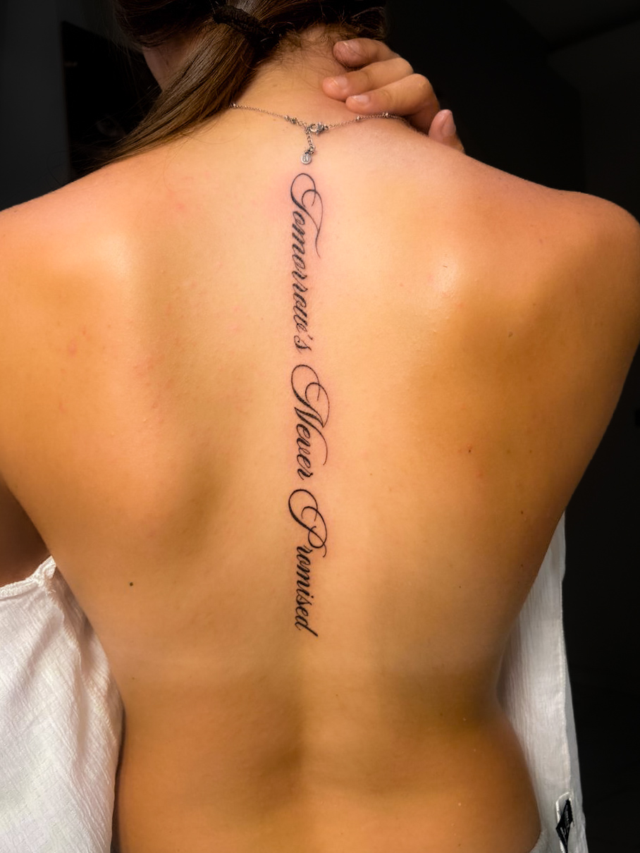 Fine line botanical tattoo on arm — minimal design for tourists at INKspire El Gouna